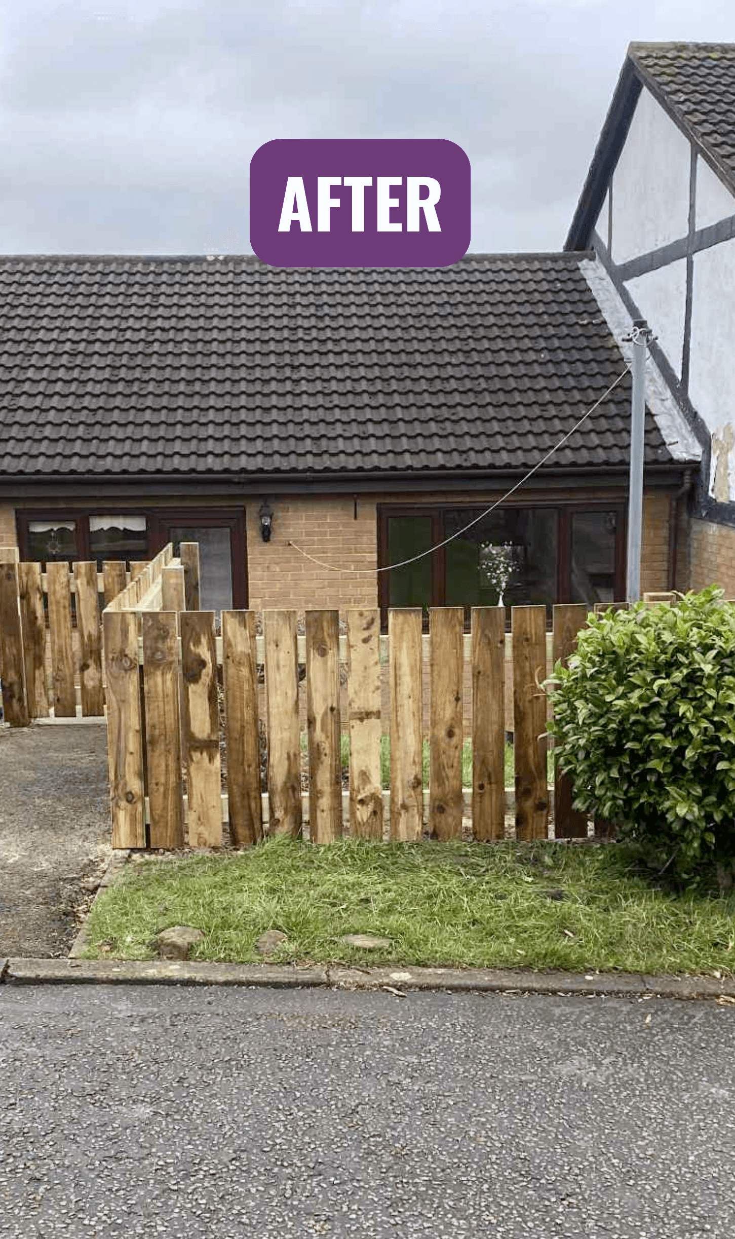 After: a new timber fence along the same driveway