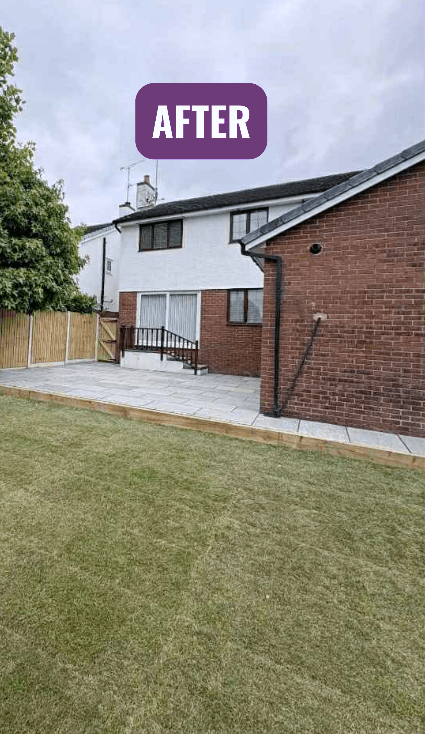 After: a level lawn, new patio and timber fencing at the same house